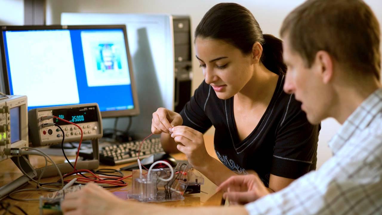 Computer Engineering Student with Professor