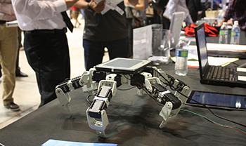 a robot or drone sits on a table